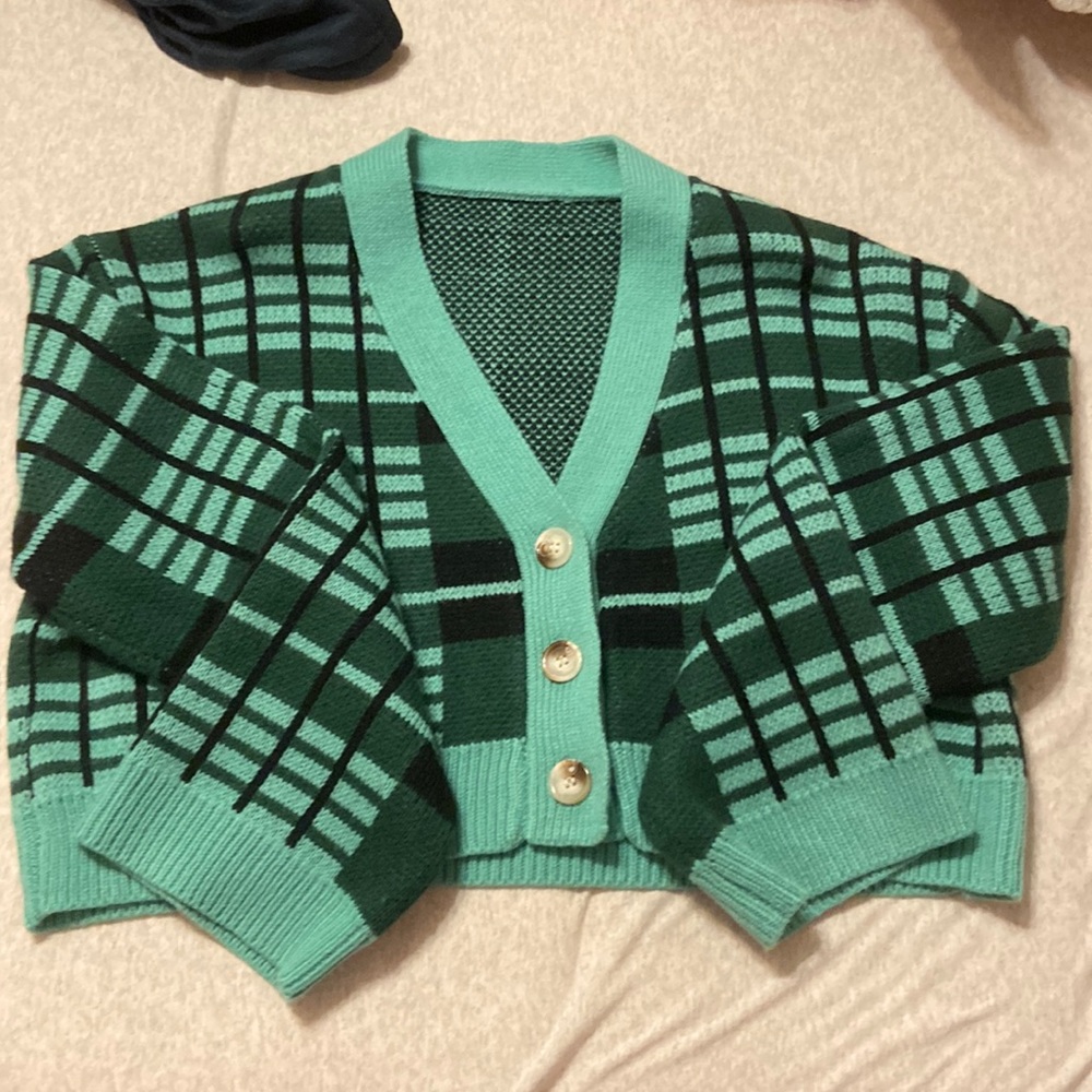 green/teal/black cardigan